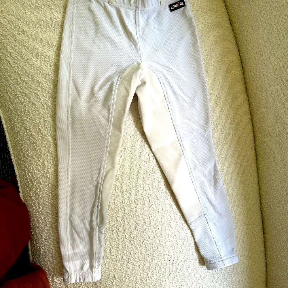 White and cream riding pants. Bought to show and second hand